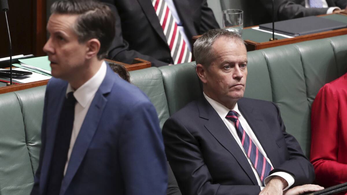 Shadow NDIS Minister Bill Shorten (right) says he wants to remain in public life after Labor's federal election defeat. Picture : Alex Ellinghausen