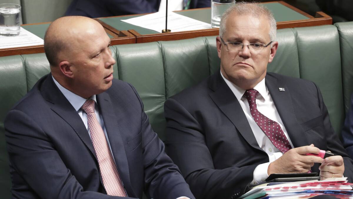 Minister for Home Affairs Peter Dutton and Prime Minister Scott Morrison. Picture: Alex Ellinghausen