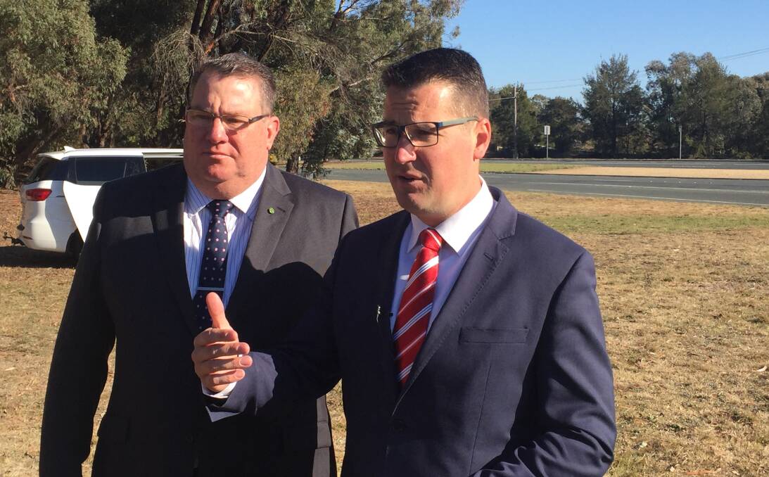 Assistant Road Safety Minister Scott Buchholz and ACT senator Zed Seselja, announcing funding for a safety upgrade to Southern Cross Drive. Picture: Andrew Brown