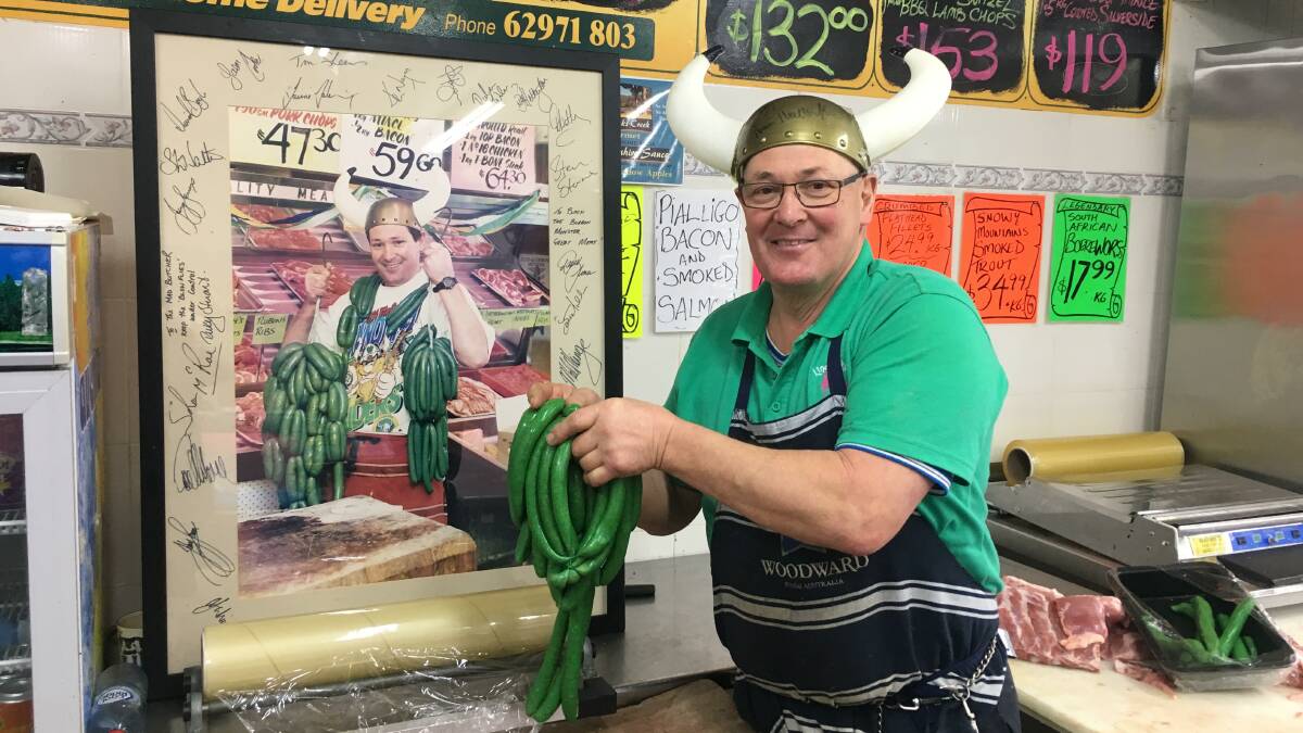 Peter "Butcher' Lindbeck's famous green sausages are a sign of hope in the Canberra community. Picture: Peter Brewer