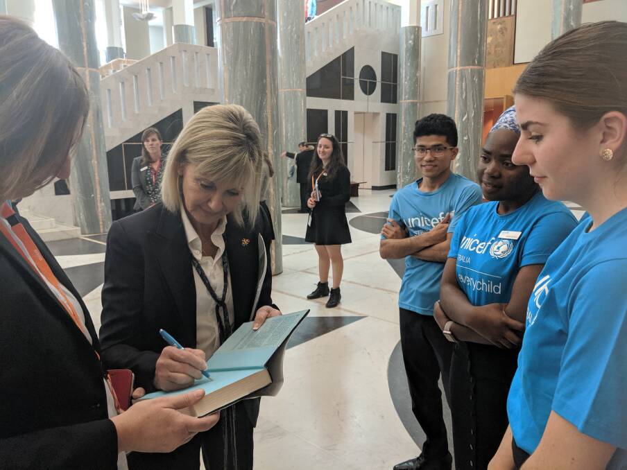 Olivia Newton-John in Question Time with her husband John Easterling (middle) and meeting UNICEF volunteers in the Marble Foyer.