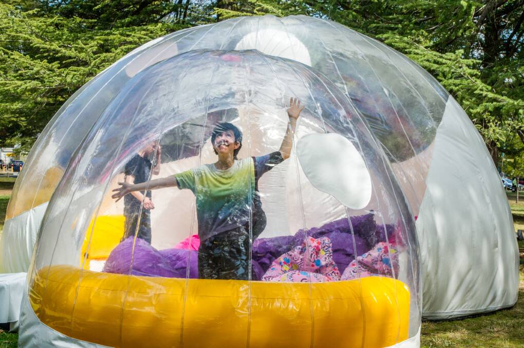 Haig Park Experiments program manager Adelaide Rief tries out the Bubble. Picture: Karleen Minney
