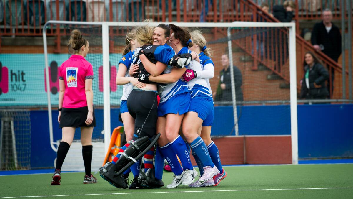 ANU players celebrate winning the grand final in a thrilling shoot-out. Picture: Elesa Kurtz