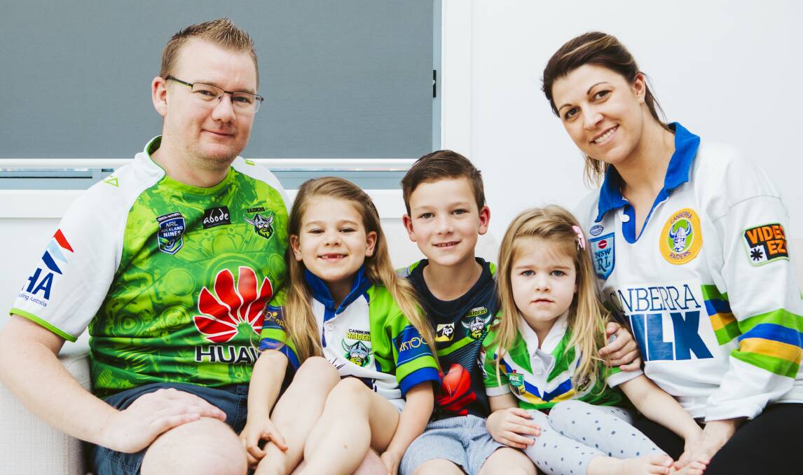 Kenrick and Kathy Winchester, with their children Darcy 6, Harry 7, and Evie 3. Excitement is high for the Winchester clan as the Canberra Raiders prepare for their first grand final in 25 years. Kenrick said the children did not get a choice when picking a team to support. Picture: Jamila Toderas