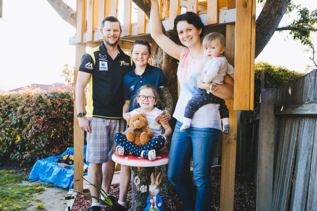 Rachel and Nathan Beasley with their children, Edward Murphy (11), Lily Beasley (5) and Henry Beasley (10 months), along with their son Nicholas' bear, called Henry. Picture: Jamila Toderas Picture: Jamila Toderas