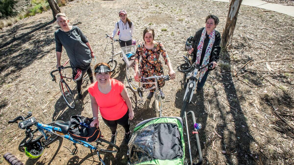 Female Canberra cyclists Arnagretta Hunter, Nicola Todd, Ulrika Li, Mia Ching and Kate Auty in Lyneham. Picture: Karleen Minney