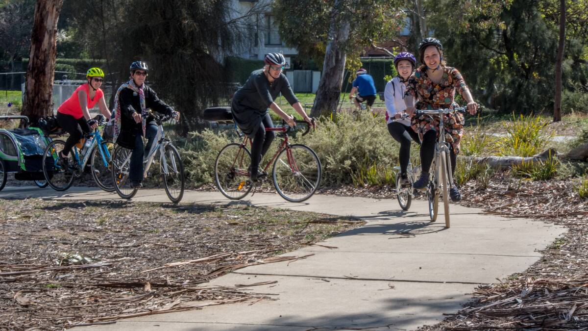 Female Canberra cyclists Nicola Todd, Kate Auty, Arnagretta Hunter, Mia Ching and Ulrika Li on a ride in Lyneham. Picture: Karleen Minney