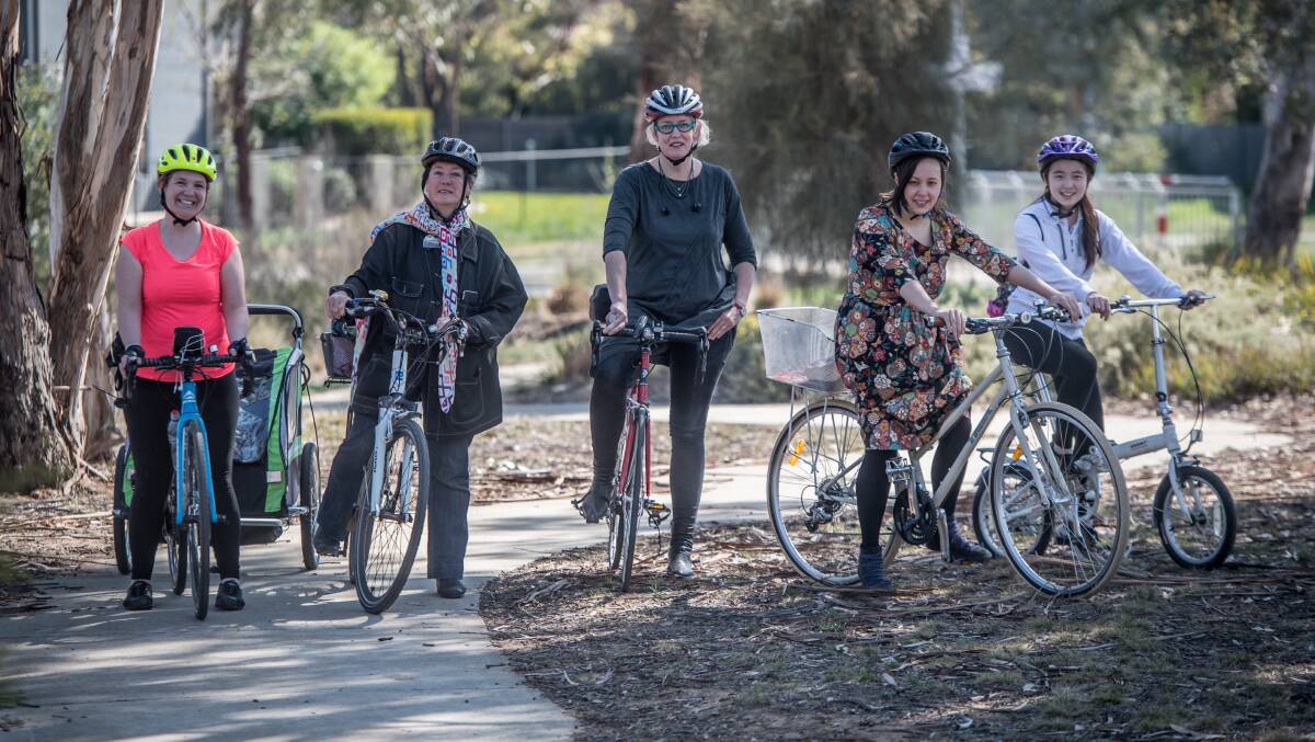 Female Canberra cyclists Nicola Todd, Kate Auty, Arnagretta Hunter, Mia Ching and Ulrika Li on a bike ride in Lyneham. Picture: Karleen Minney