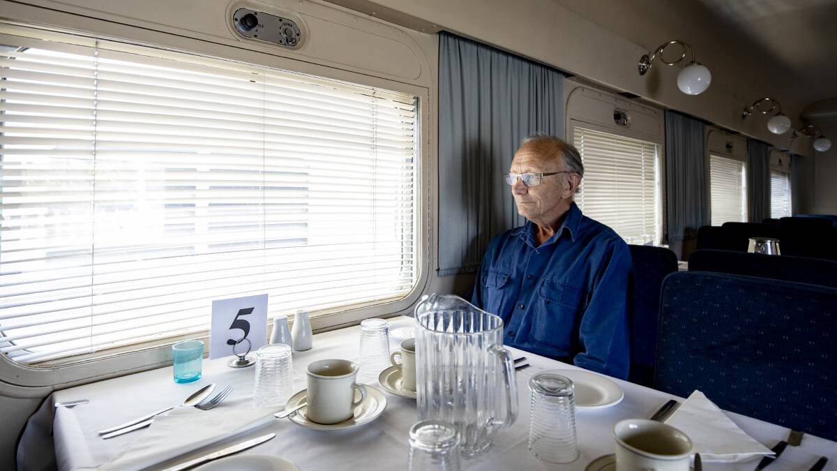 Canberra Railway Museum director John Cheeseman in a Southern Aurora dining car from 1950. Picture: Sitthixay Ditthavong