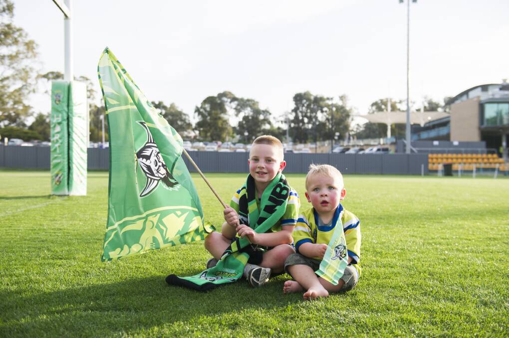 Dylan Mitchell, 6, and Leo Mitchell, 2, ahead of Sunday's grand final. Picture: Dion Georgopoulos