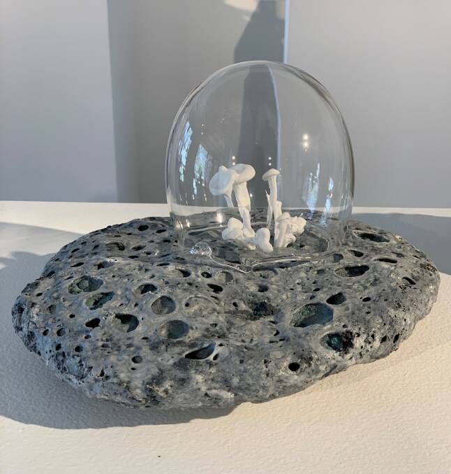 Mahala Hill, Luna Petrification (detail), above, in Canberra Potters Annual Members' Exhibition at Watson Arts Centre. Rita Evans, Landscape Bottle, left, Marion Robinson, Adani Feeding Bowl, far right. Pictures: Supplied