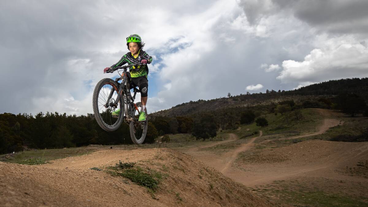 Twelve-year-old Obi Channing hitting the mountain bike trails at Stromlo. Picture: Sitthixay Ditthavong