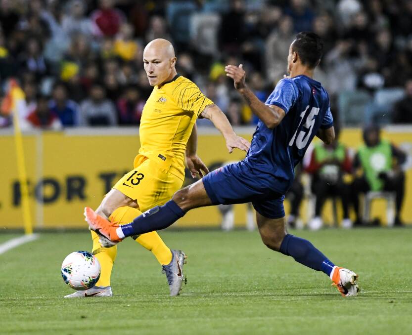 Sujal Shreshtha attempts to intercept Aaron Mooy. Picture: Dion Georgopoulos