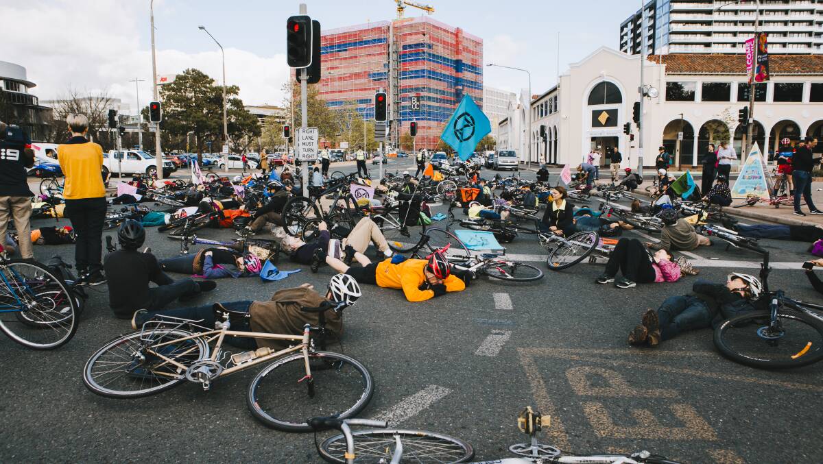 Extinction Rebellion protesters blocked busy interactions at a "die-in" in Canberra last Friday. Picture: Jamila Toderas