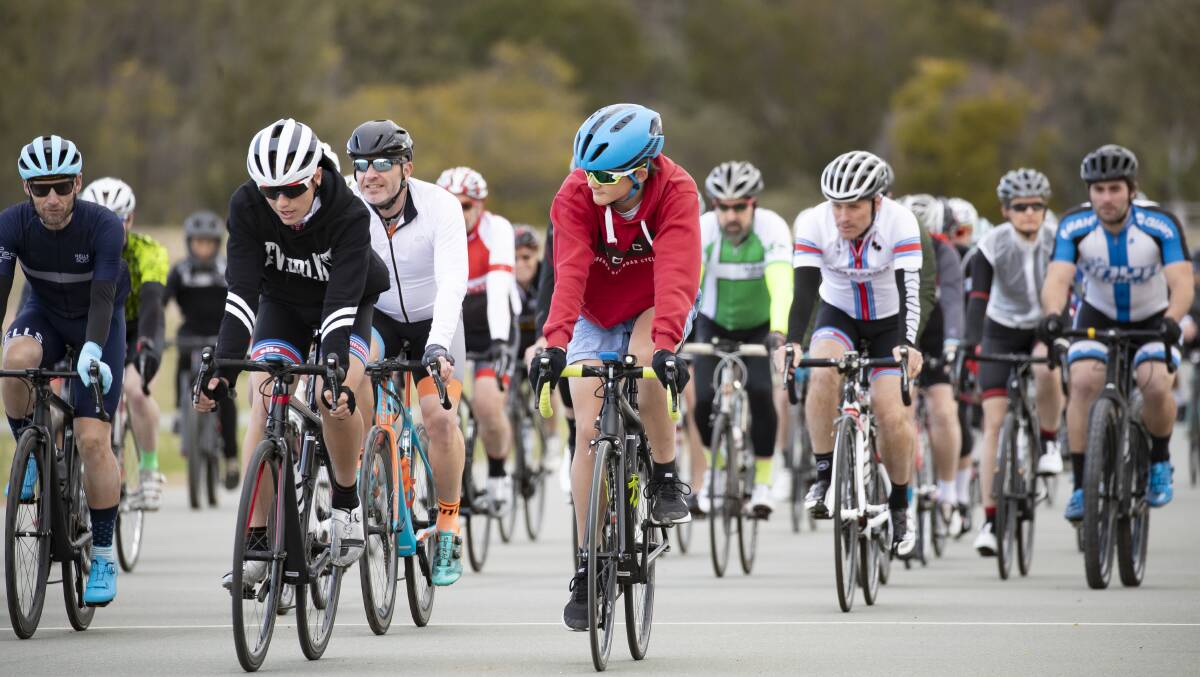 Cyclists take to the criterium track at Stromlo Forest Park on Friday afternoon, which the government has confirmed will stay in its current form. Picture: Sitthixay Ditthavong