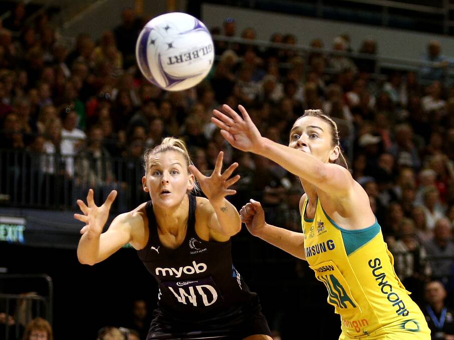 New Zealand's Katrina Rore and Australia's Liz Watson vie for the ball. Picture: Getty Images