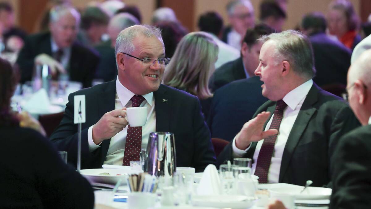 Prime Minister Scott Morrison and Opposition Leader Anthony Albanese during the National Prayer Breakfast at Parliament House on Monday. Picture: Alex Ellinghausen