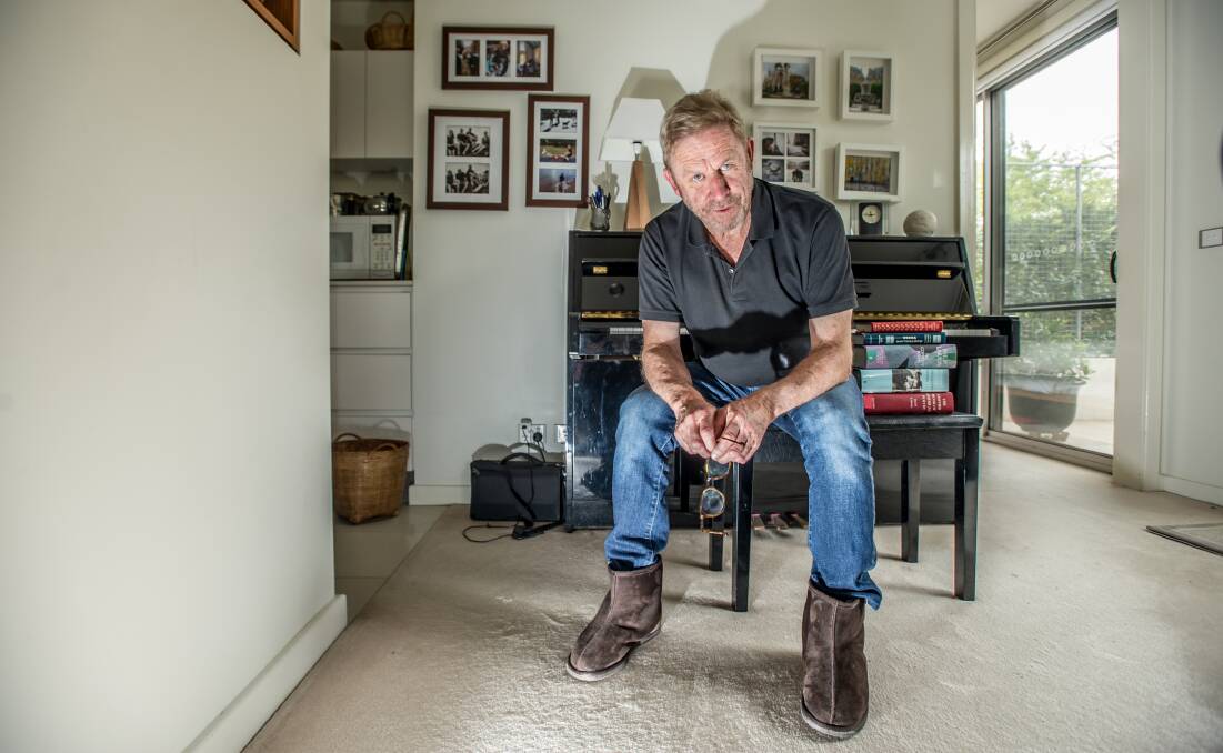 Canberra poet John Foulcher in his Kingston home. He thinks of himself as a writer of poems - not a poet. Picture: Karleen Minney
