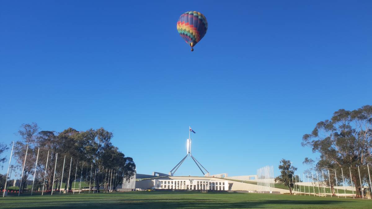 The Greens' climate emergency balloon in a test flight over Parliament House last week. The Greens have now been banned from flying the balloon. Picture: Supplied