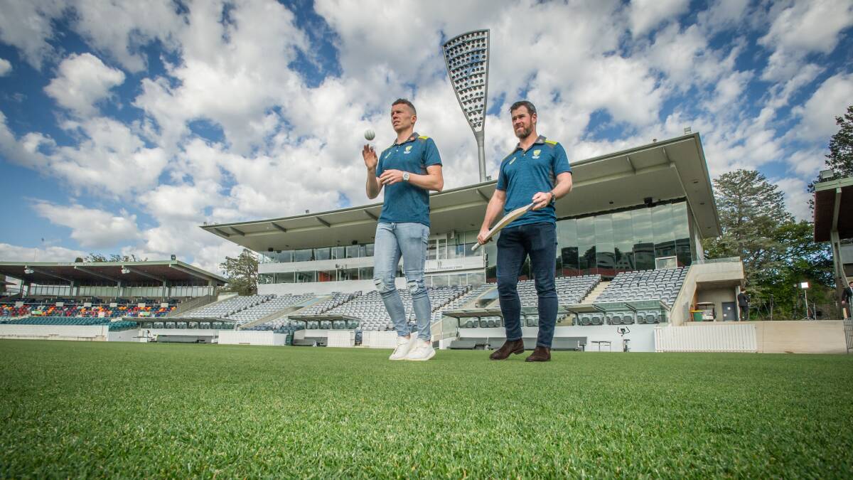 Prime Minister's XI co-captains Peter Siddle (left) and Dan Christian at Manuka Oval. Picture: Karleen Minney