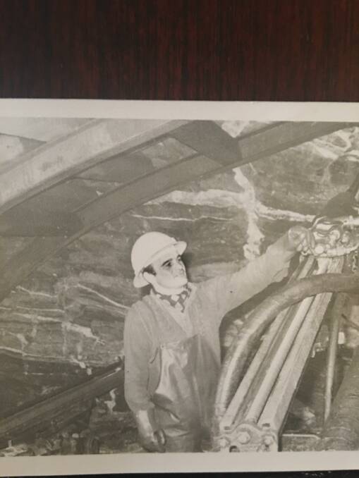 Charlie Salvestro posing with the drilling machine at tunnel face at Burns Creek. Picture: Supplied