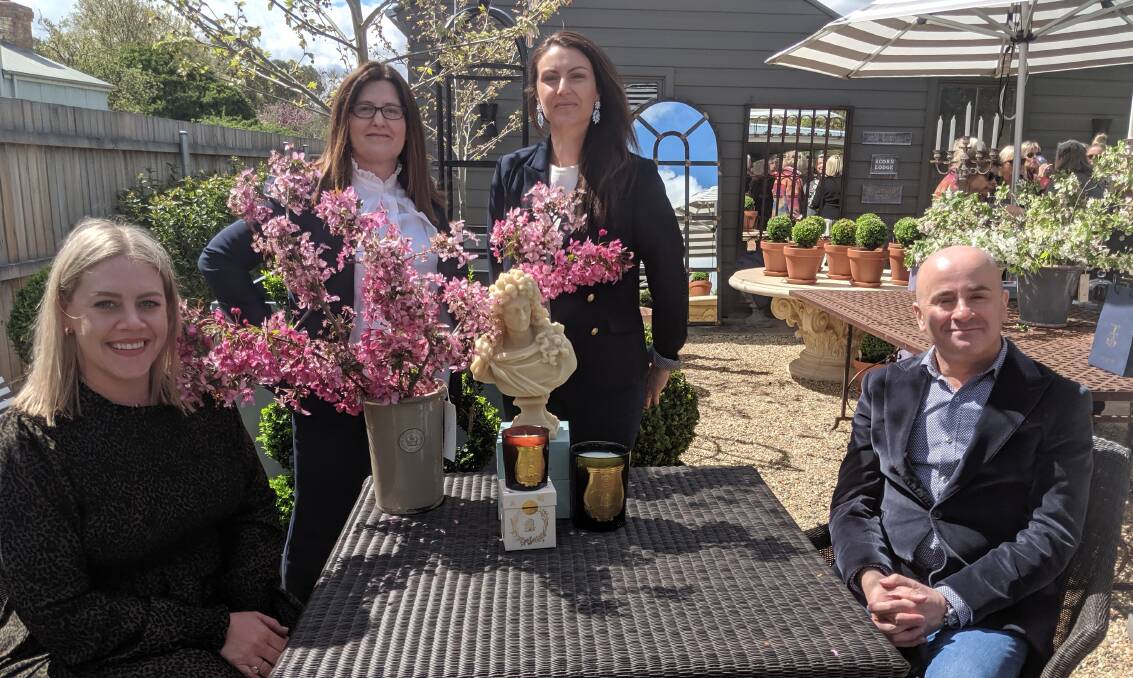 Cire Trudon agents Sarah Cronk and Michael Marzano (seated) with Manon and Moss owner Alix Burnett and interior designer Lauren Gundry in Bungendore. Picture: Supplied