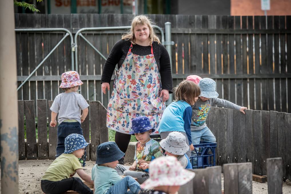 Sharon Champion is the first woman with down syndrome to get her child care qualifications and is working at Stella bella childcare in Fyshwick. Picture: Karleen Minney