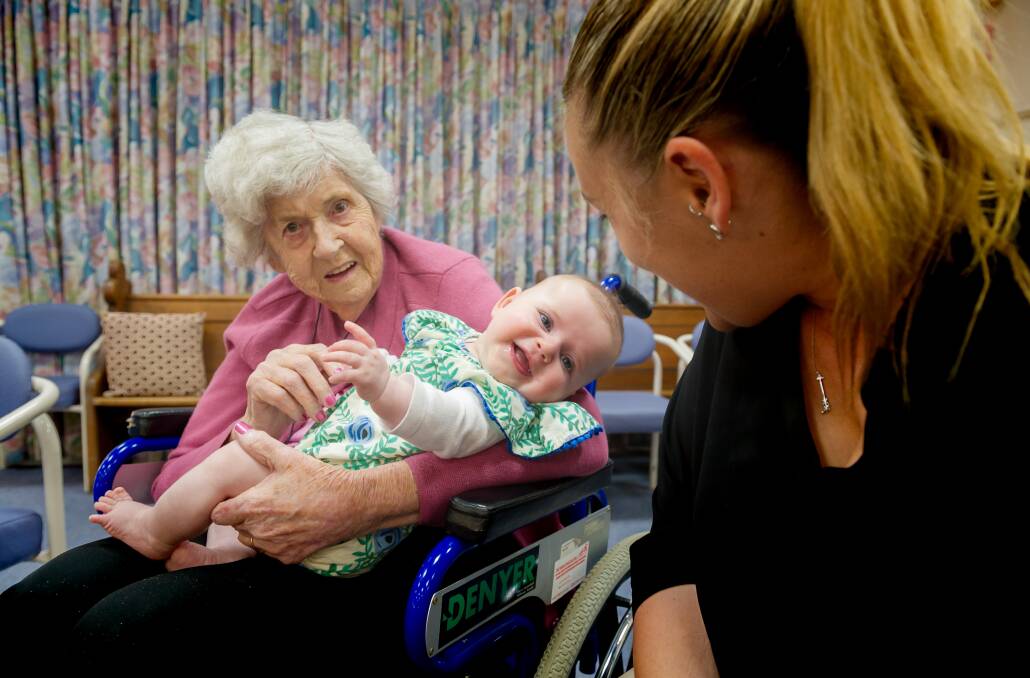 St Andrew's Village resident Valerie Apps with five-month-old Florence Newman and mum Sarah on Wednesday. Picture: Elesa Kurtz