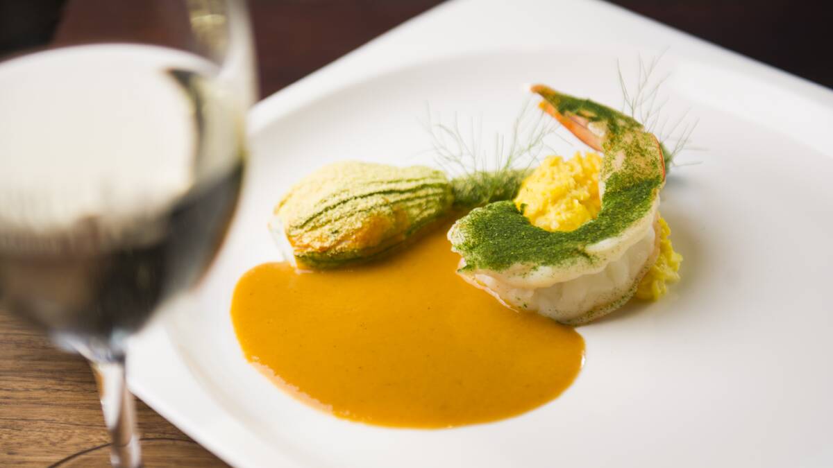 Zucchini blossom, prawn mousse, sweet corn, and crustacean bisque. Pictures: Dion Georgopoulos