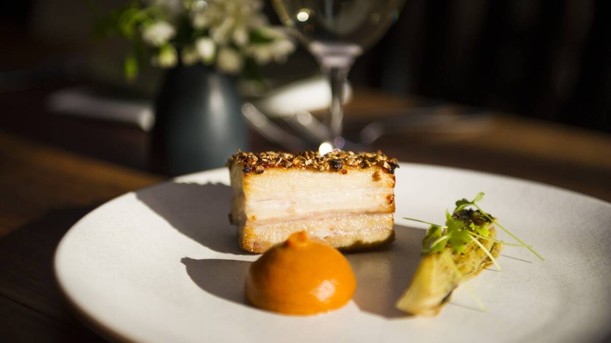 Honey glazed pork belly with barbecued carrot and pickled lettuce. 