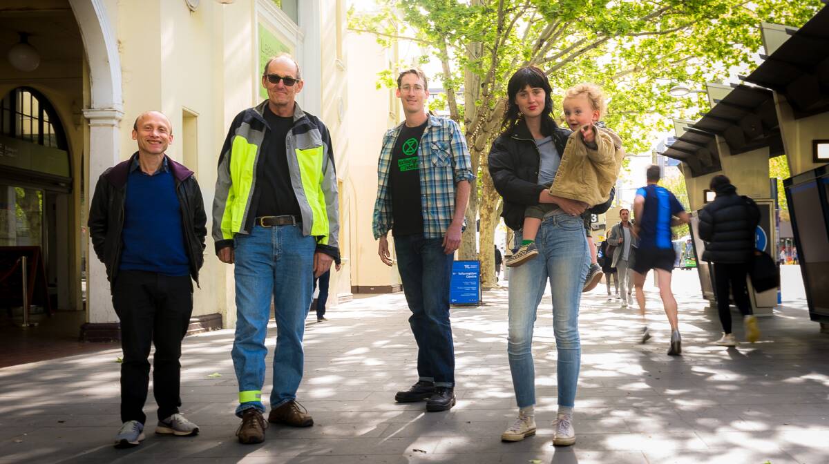 Extinction Rebellion members in Canberra Leo Bild, Terry Gras, Jeremy Michael with Esther and Monty Marsh. Picture: Elesa Kurtz