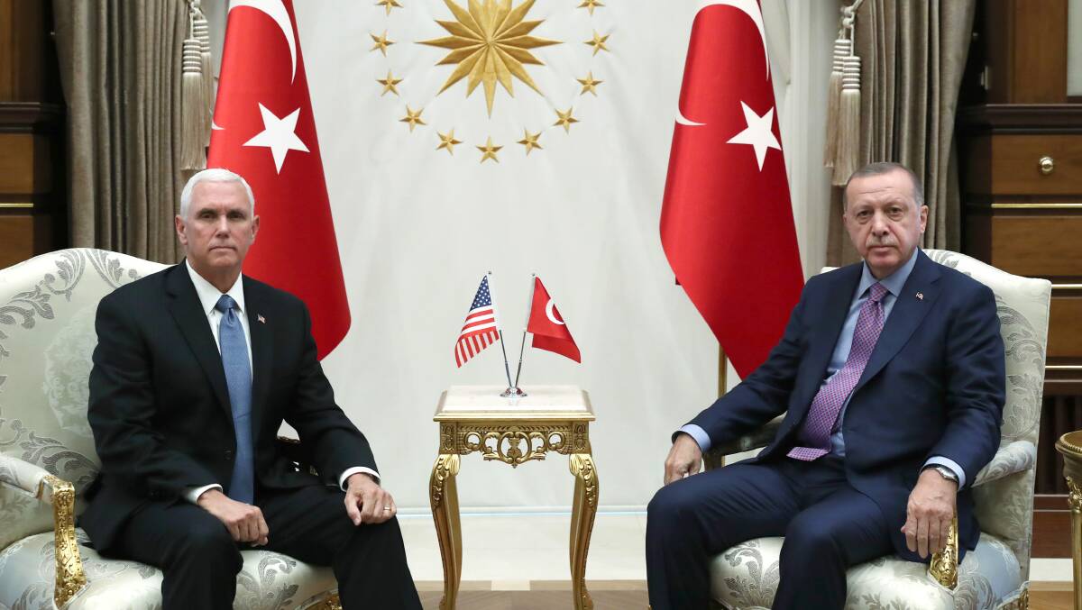 Turkish President Recep Tayyip Erdogan receives U.S. Vice President Mike Pence at Presidential Complex in Ankara, Turkey on October 17. Picture: Murat Cetinmuhurdar, Turkish Presidency via Getty Images.