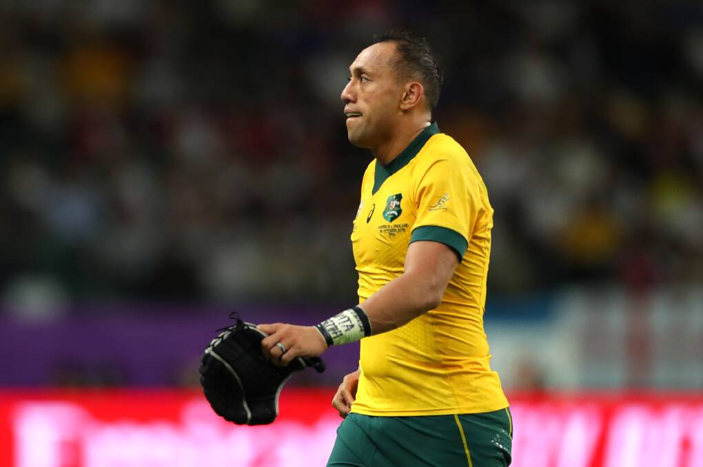 Christian Lealiifano of Australia looks dejected as he is substituted. Picture: Getty Images