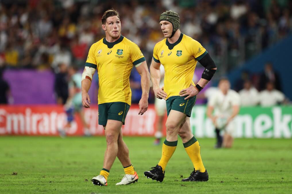 Michael Hooper and David Pocock discuss the Wallabies' woes during the loss. Picture: Getty Images