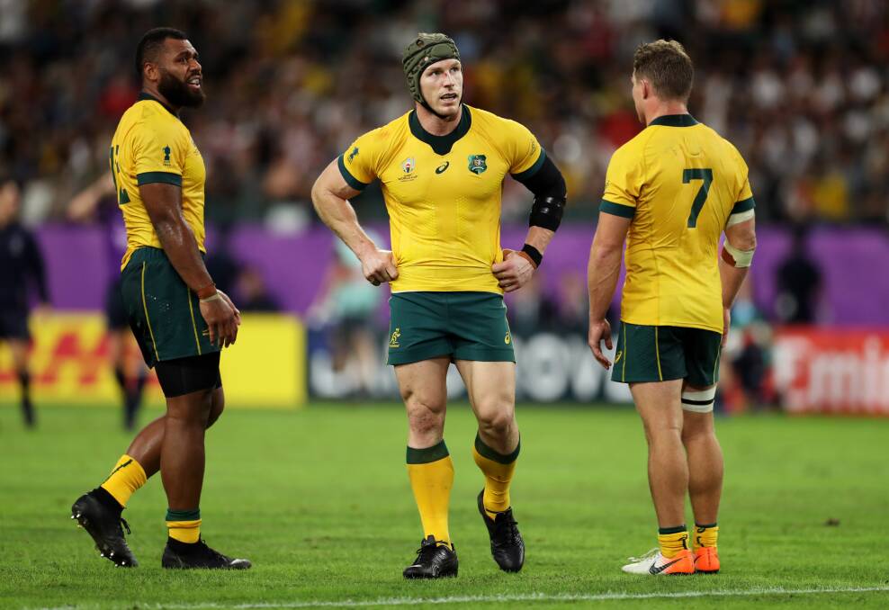 Samu Kerevi, David Pocock and Michael Hooper of Australia show their dejection. Picture: Getty Images
