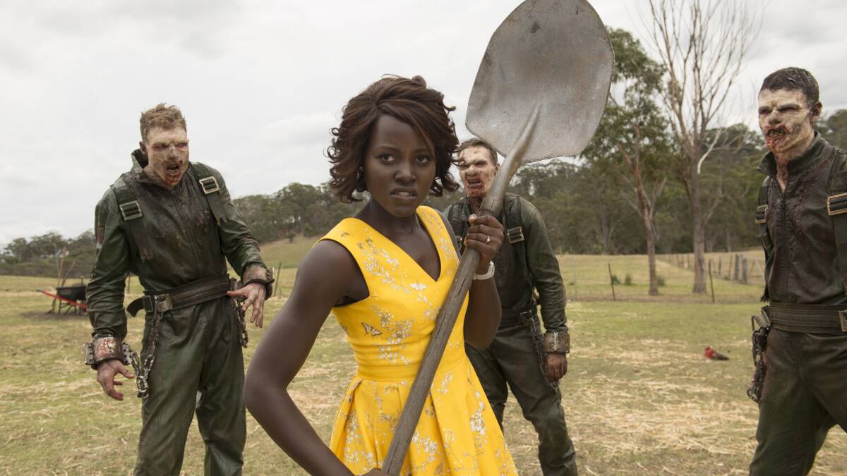 Lupita Nyong'o, centre, as school teacher Miss Caroline in the film Little Monsters (2019). Picture: Simon Cardwell/Supplied