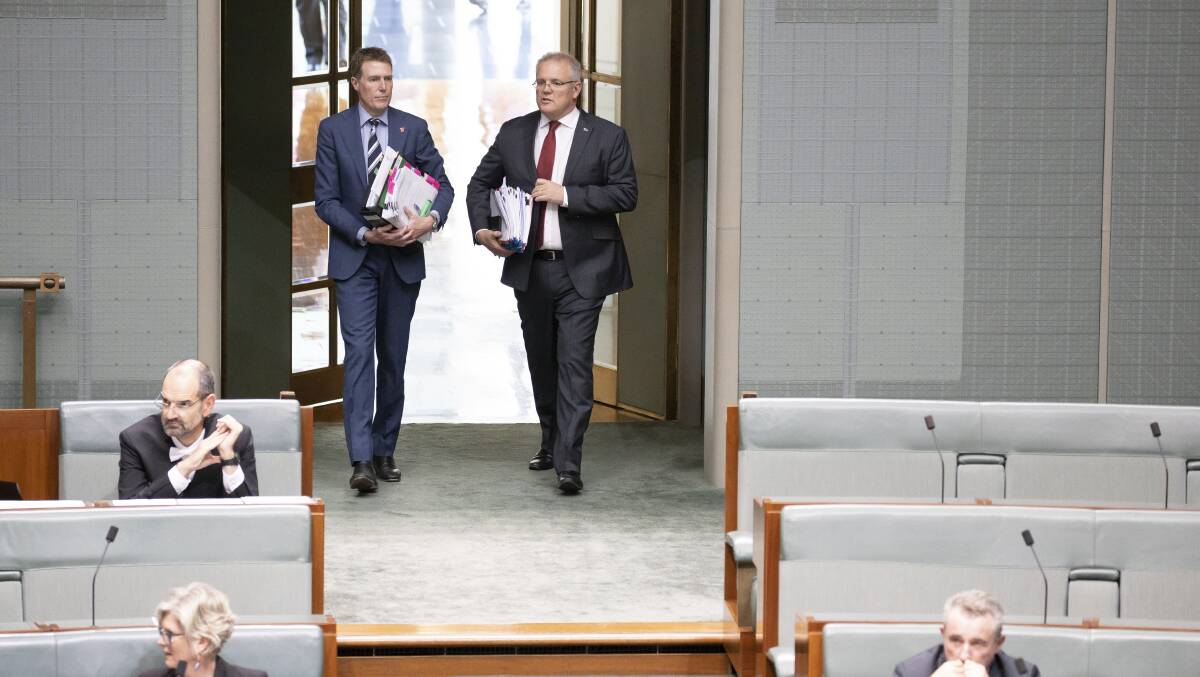 Attorney-General Christian Porter and Prime Minister Scott Morrison in Parliament last year. Picture: Sitthixay Ditthavong