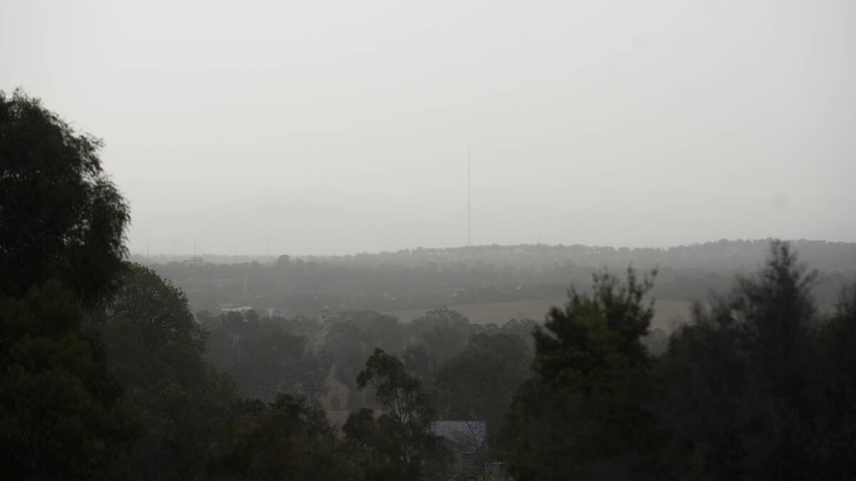 Westerly winds blew dust across Canberra on Friday afternoon sparking a health warning for people with allergies and respiratory conditions. Picture: Dion Georgopoulos