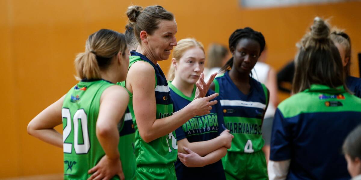 WORDS OF WISDOM: Warrnambool Mermaids coach Katie O'Keefe gives her team some advice on Saturday night. Picture: Anthony Brady