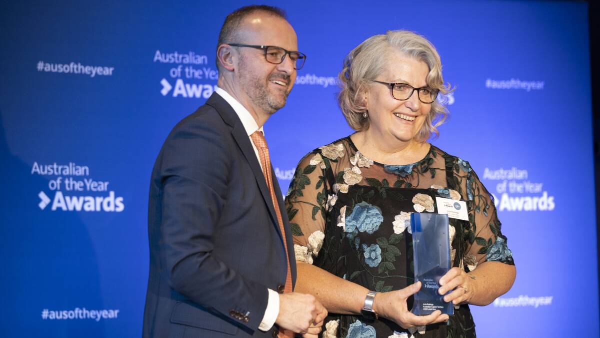 ACT Chief Minister Andrew Barr presents Julia Rollings with the 2020 ACT Local Hero award. Picture: Sitthixay Ditthavong