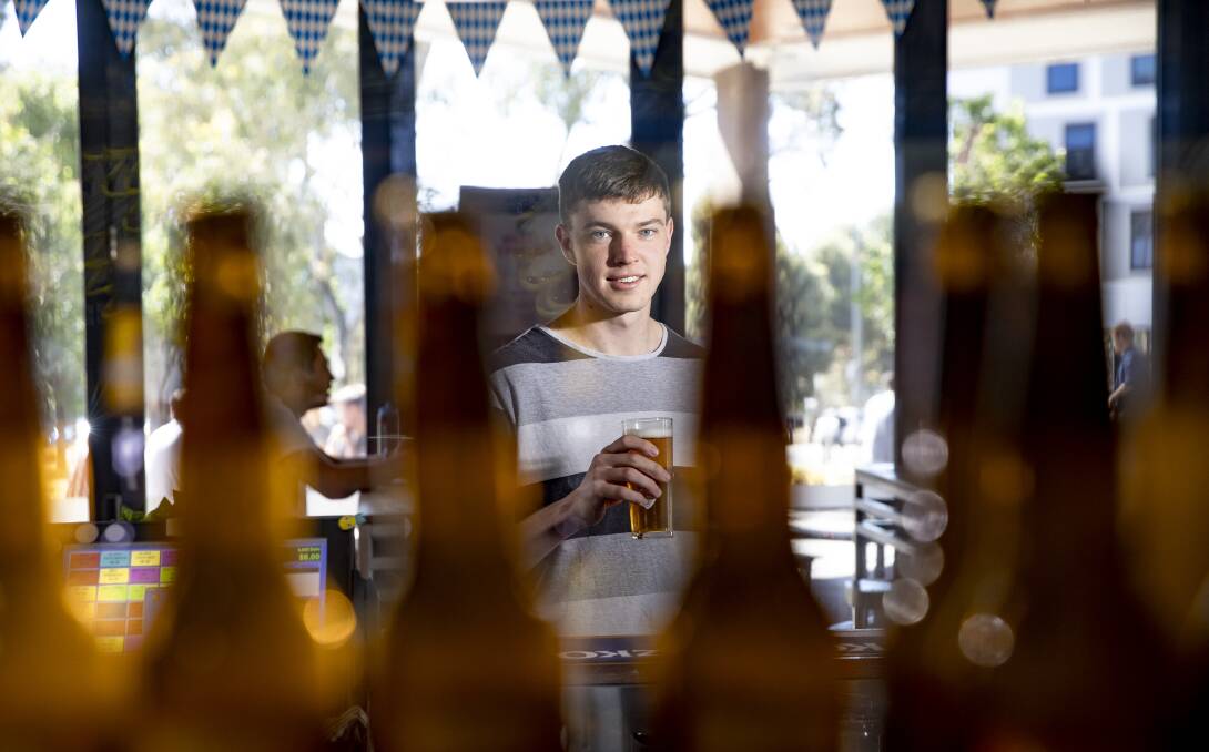 Andrew Giumelli runs student clubs and events at the University of Canberra and says drinking culture is improving on campus. Picture: Sitthixay Ditthavong