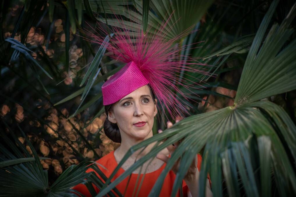 Sally Martin says Christine Waring's hats are works of art. Picture: Karleen Minney