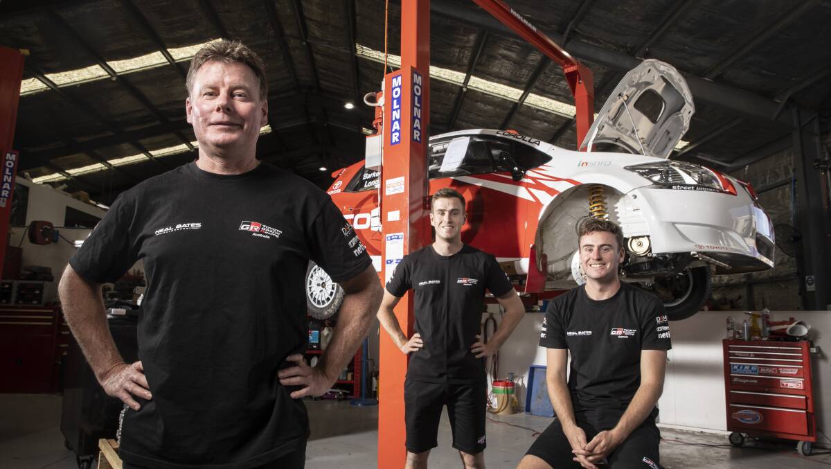 Rally car drivers Neal, Lewis, and Harry Bates at the Hume workshop of the Toyota rally team. Picture: Sitthixay Ditthavong