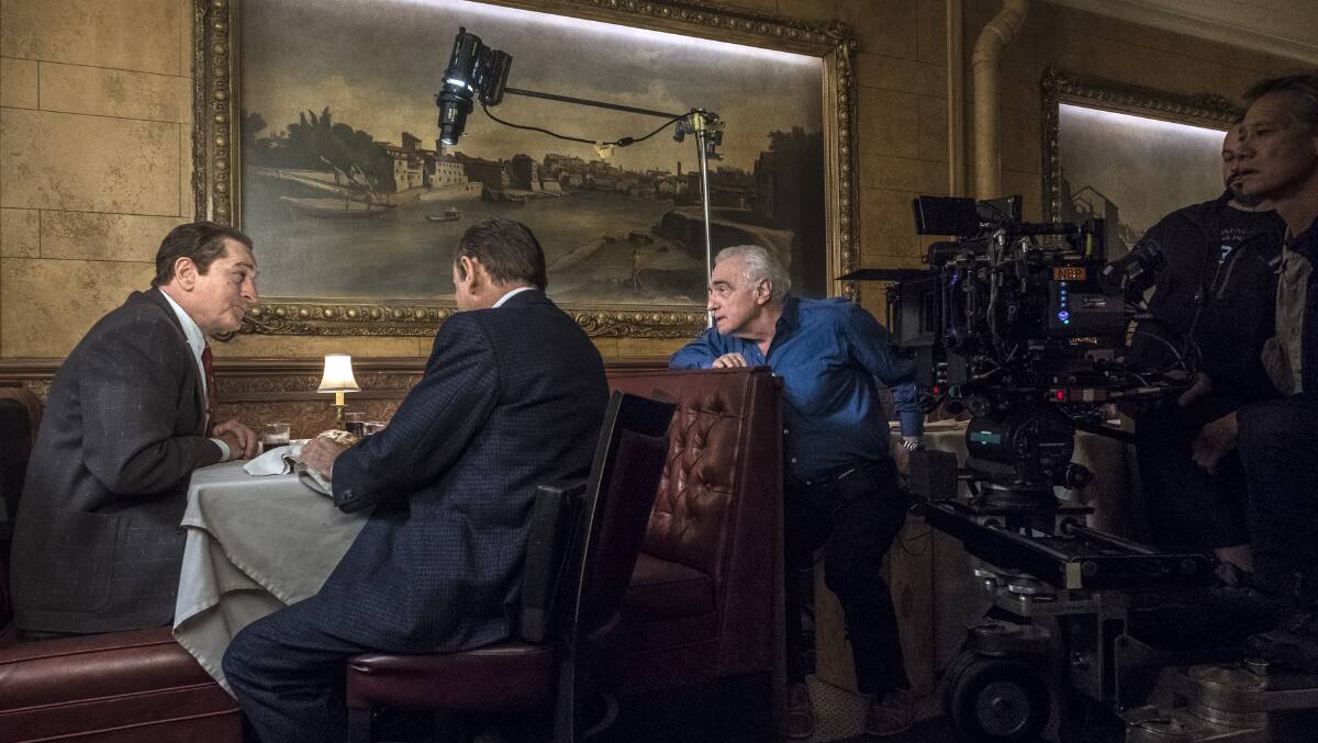 Martin Scorsese, right, directs Joe Pesci in a scene from The Irishman. Picture: Niko Tavernise/Netflix.