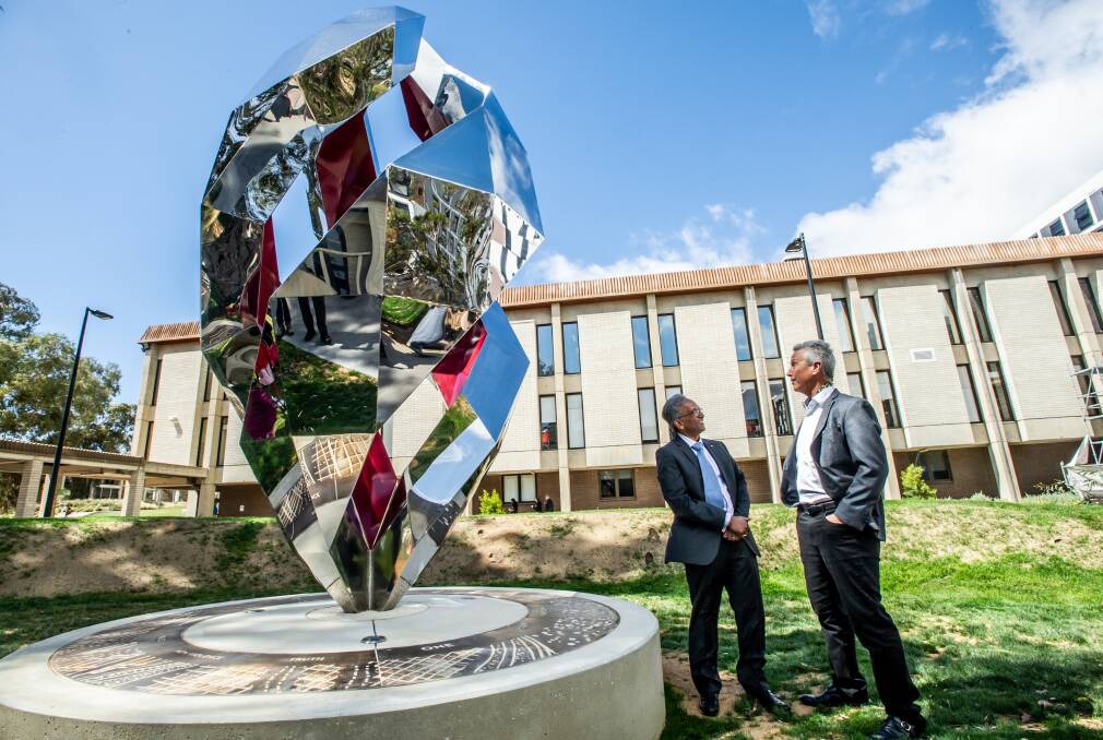  The new sculpture ONE with its benefactor, Canberra dentist Dr Naren Chellappah and creator, Perth artist Geoffrey Drake-Brockman. Picture: Karleen Minney