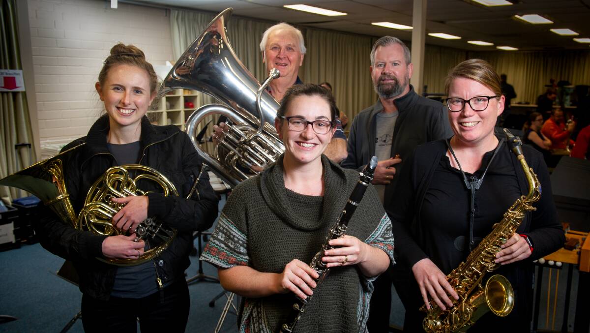 Canberra Wind Symphony members (from left) Natasha Meston, Steve Lucas-Smith, Molly Campbell, Geoff Grey and Marijke Welvaert. They will perform on Monday in commemoration of Remembrance Day. Picture: Elesa Kurtz