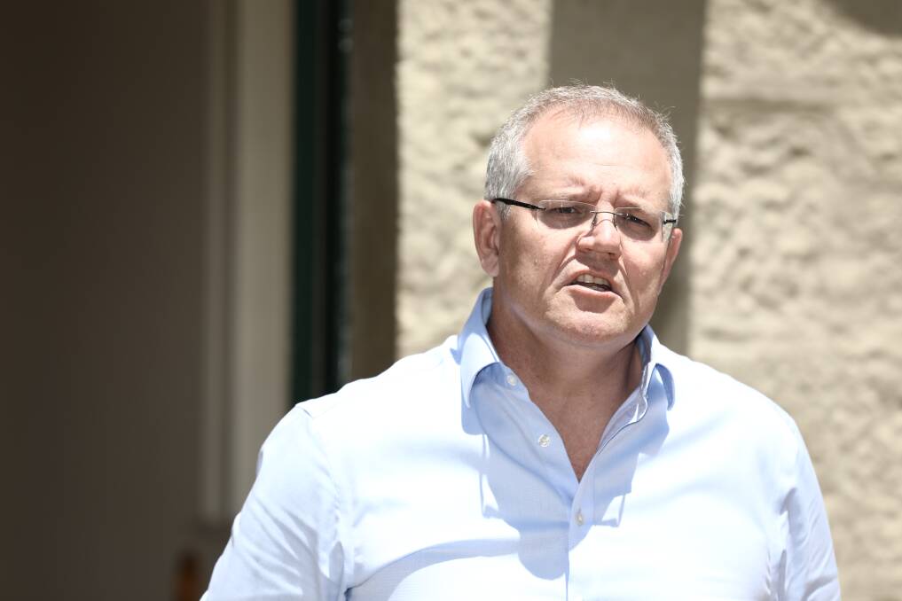Prime Minister Scott Morrison speaks to the media about the federal government's response to the bushfires across NSW and Queensland at Kirribilli House on Saturday. Picture: Dominic Lorrimer