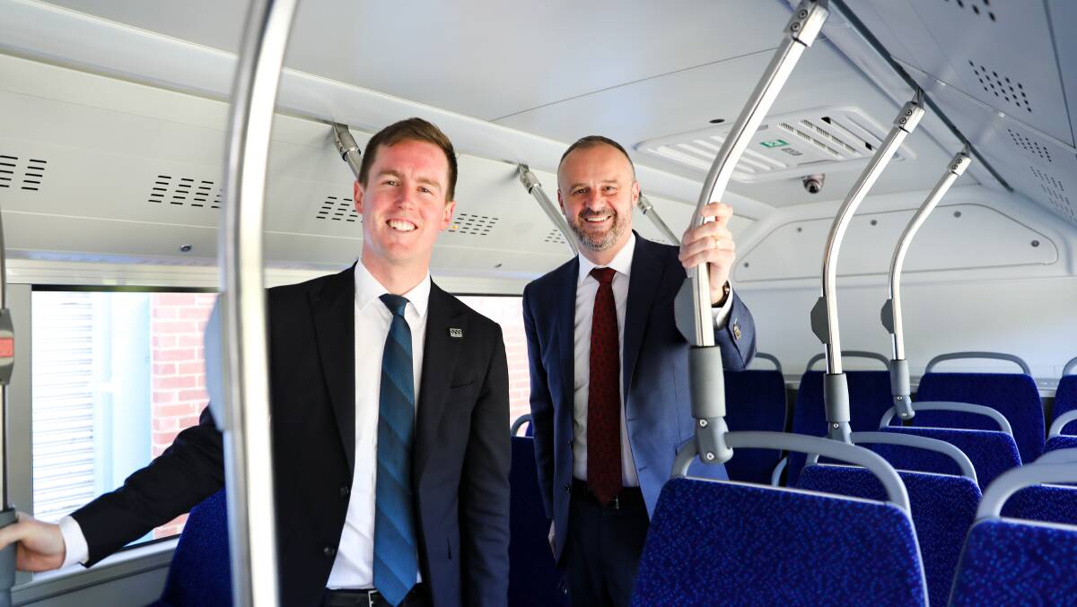 Transport Minister Chris Steel and Chief Minister Andrew Barr inspecting the Yutong Electric E12 bus. Picture: Supplied