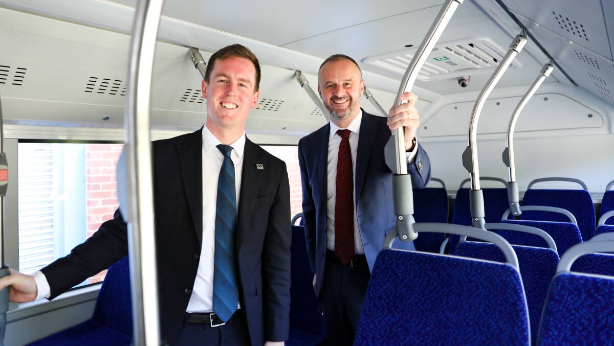 ACT transport minister Chris Steel and chief minister Andrew Barr inspecting the Yutong Electric E12 bus. Picture: Supplied