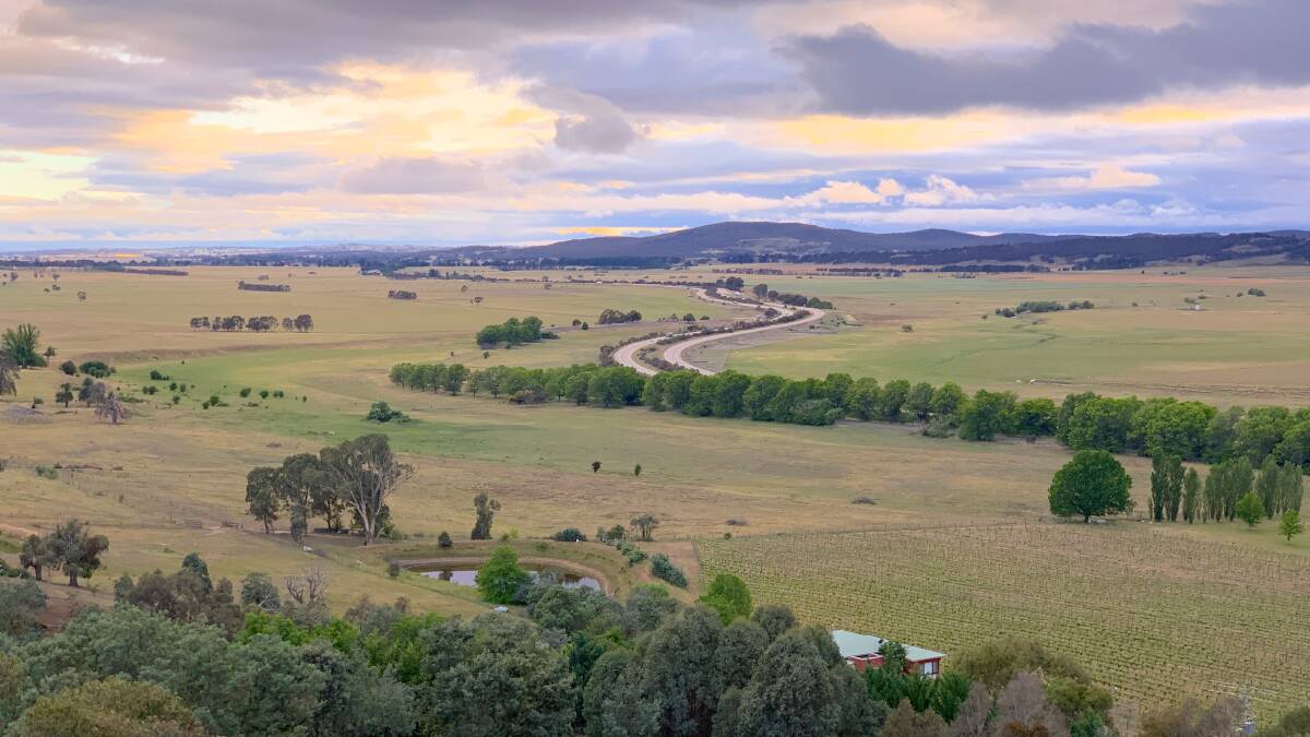 Looking out over the moody Collector floodplains from just above Little George, the tiny house at Lake George Winery. Picture: Tim the Yowie Man